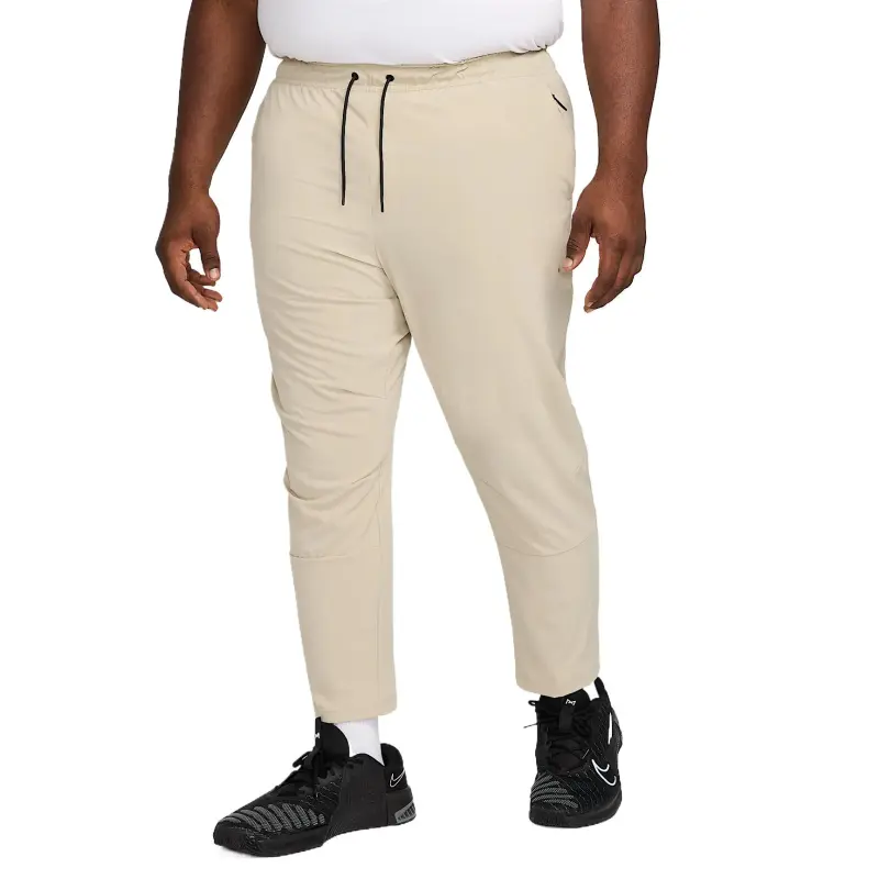 Nike Unlimited Men's Dri FIT Tapered Leg Versatile Pants-1