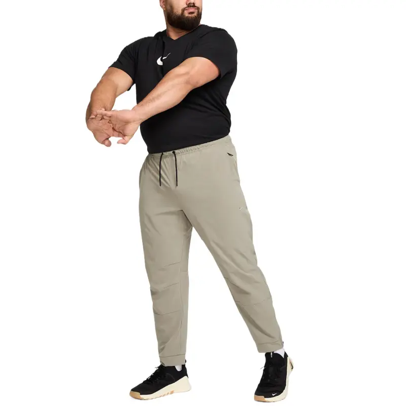 Nike Unlimited Men's Dri FIT Zippered Cuff Versatile Pants-5