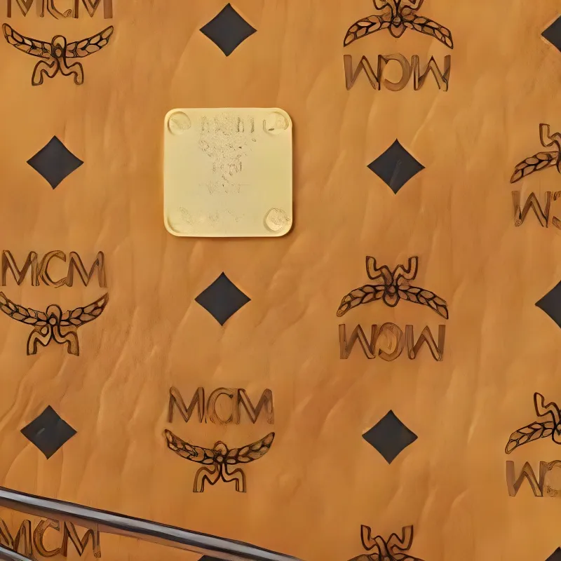 MCM Aren Intertwined Letter Canvas Clutch Large Size Women's Brown-4