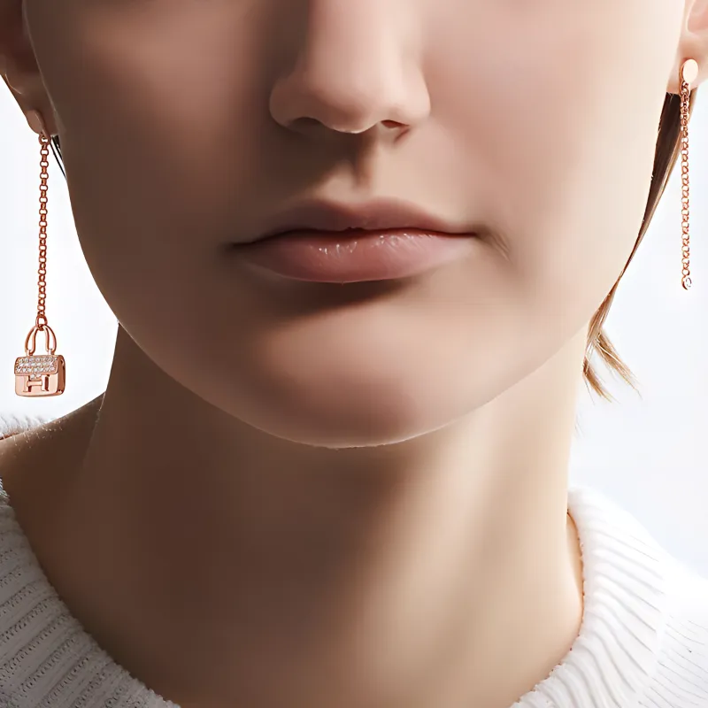 HERMES Constance Earrings Women's Rose Gold-1