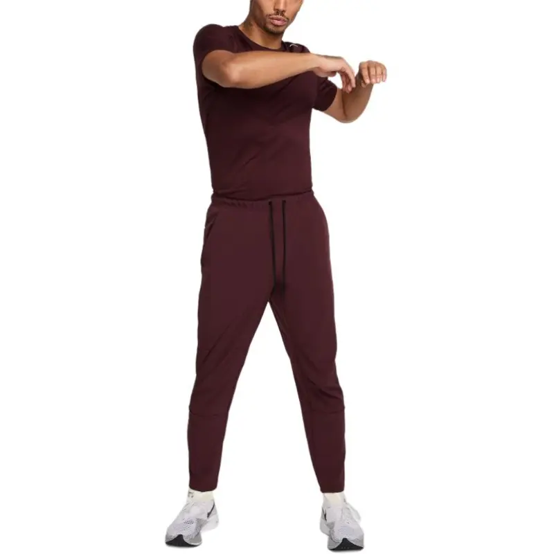 Nike Unlimited Men's Dri FIT Tapered Leg Versatile Pants-2