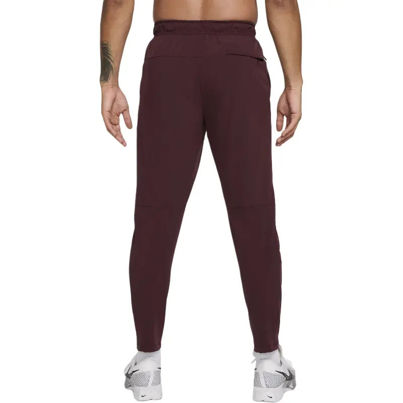 Nike Unlimited Men's Dri FIT Tapered Leg Versatile Pants-1