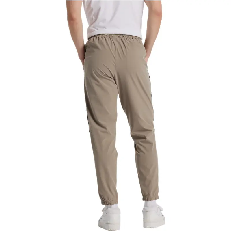 New Balance SS25 Sports Pants Men's Brown-1