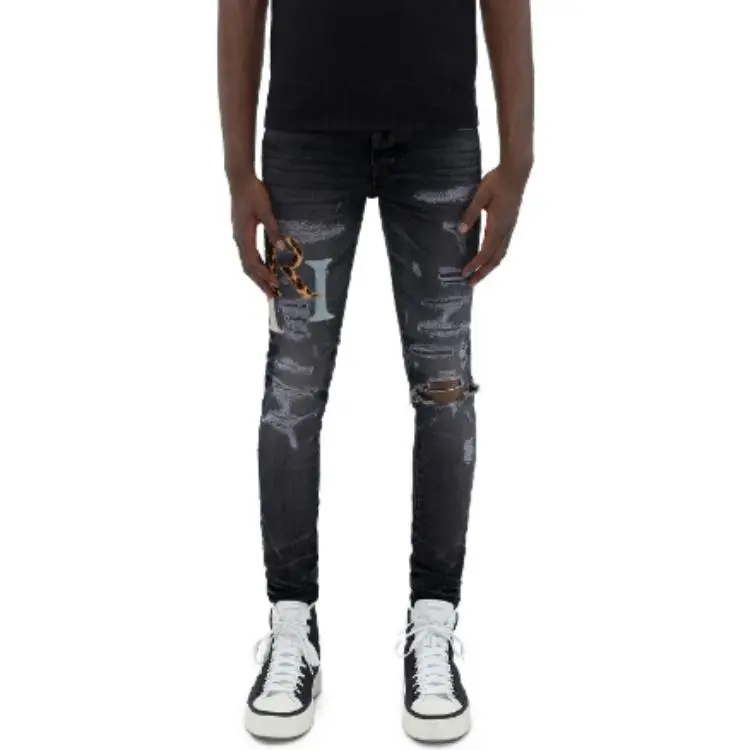 AMIRI Multi Leather Staggered Logo Jean-1