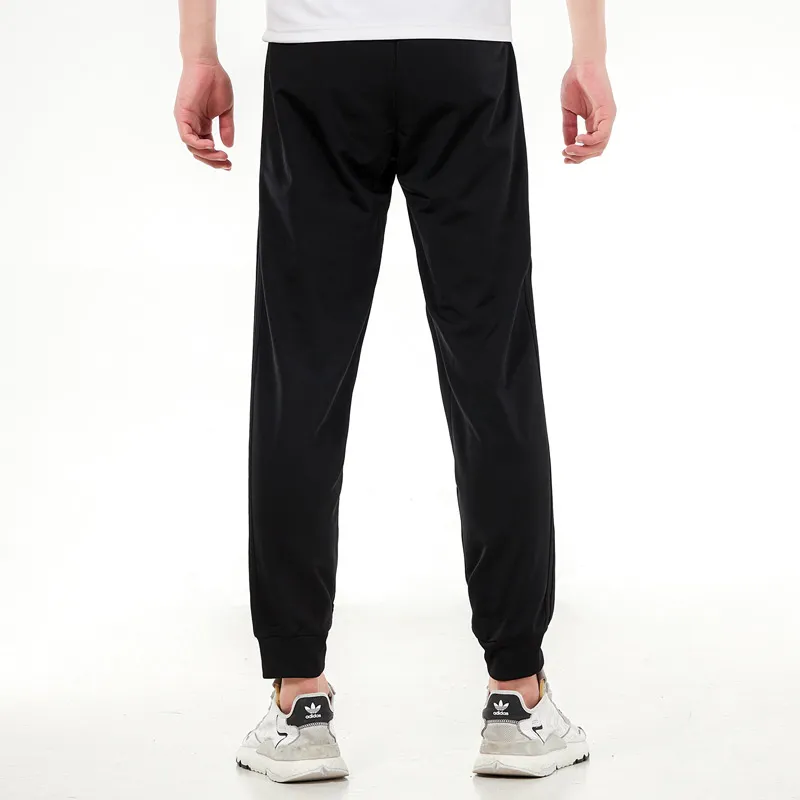 Adidas Essentials Warm Up Tapered 3 Stripes Track Pants-2