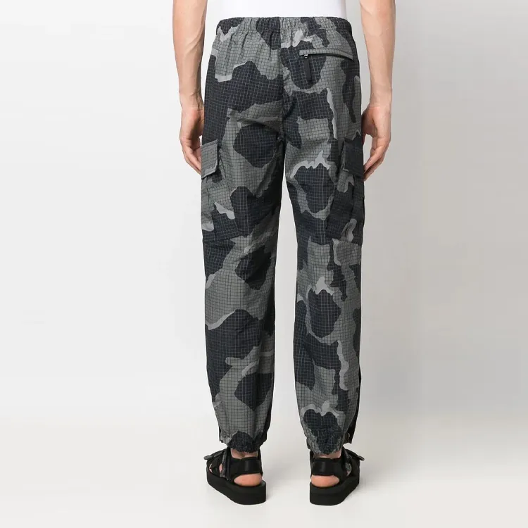 UNDERCOVER Camouflage print Jogger Pants-5