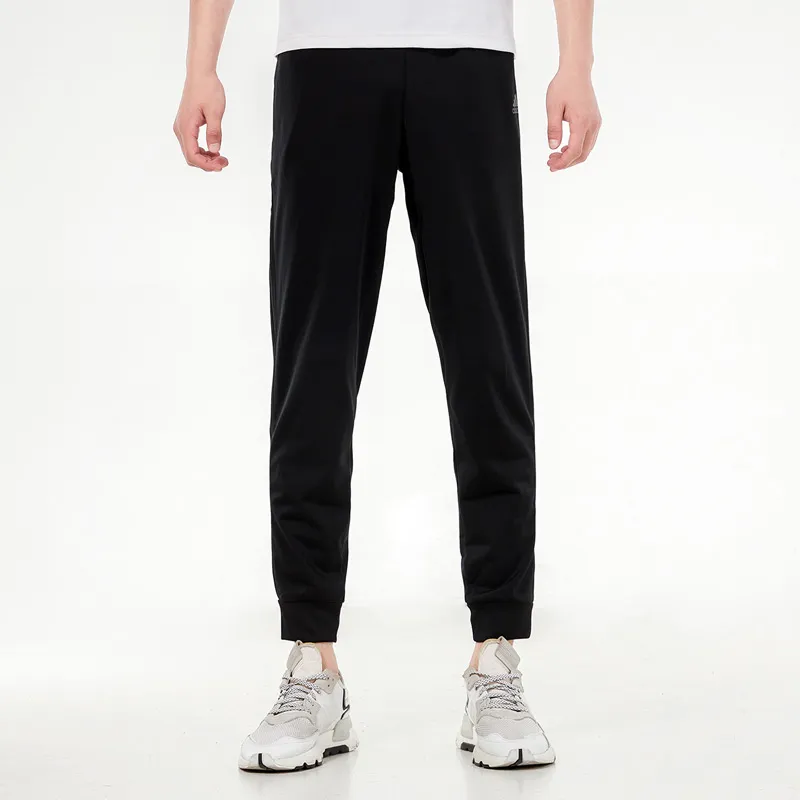 Adidas Essentials Warm Up Tapered 3 Stripes Track Pants-1