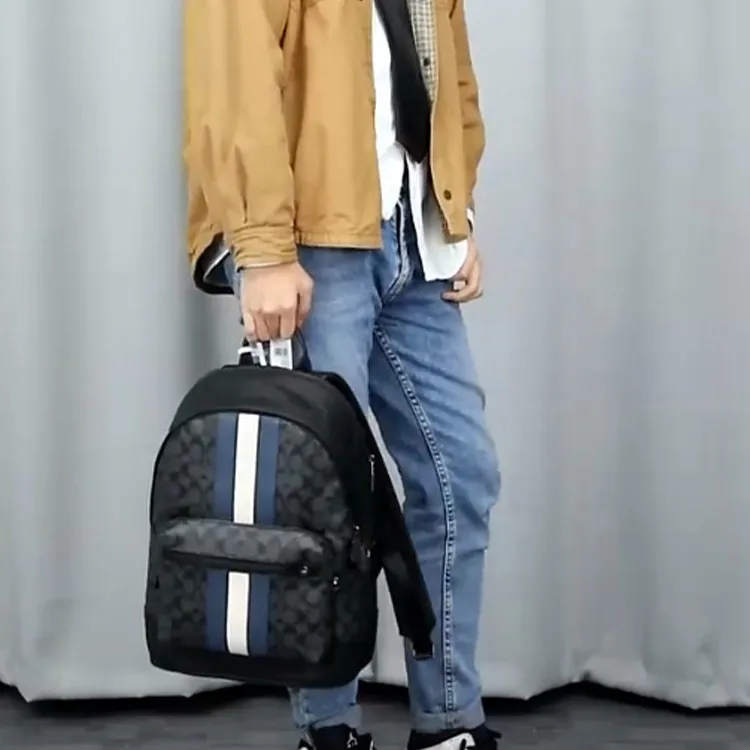 COACH West Backpack In Signature Canvas With Varsity Stripe-6
