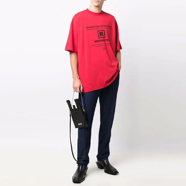 RAF SIMONS Logo patch Bootcut Jeans-1