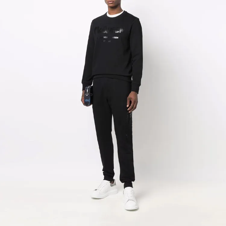 Alexander McQueen Logo Printed Slim Cut Track Trousers-1