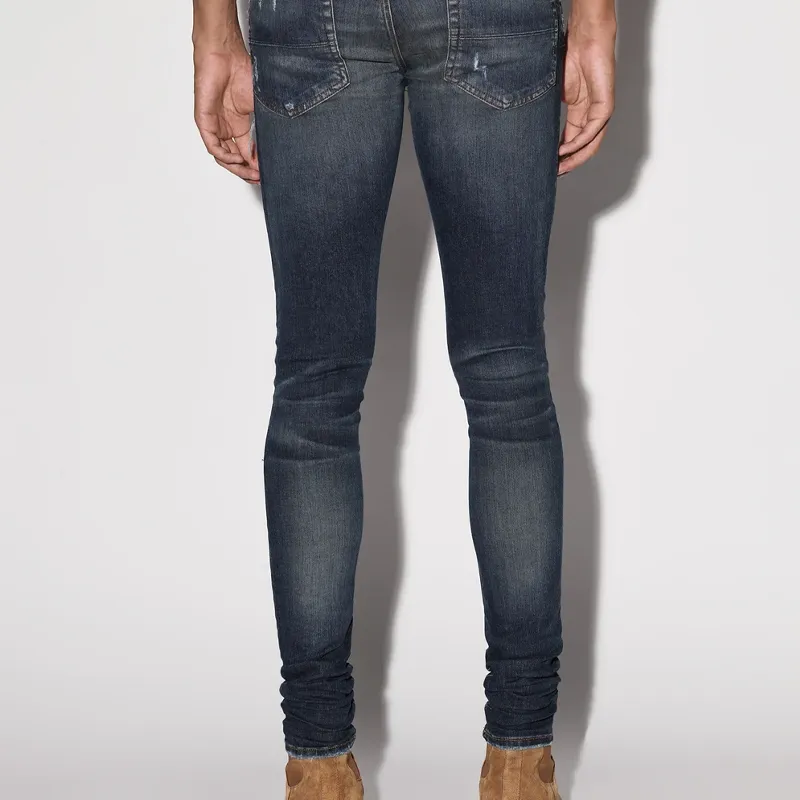 AMIRI Logo Distressed Skinny Jeans-2