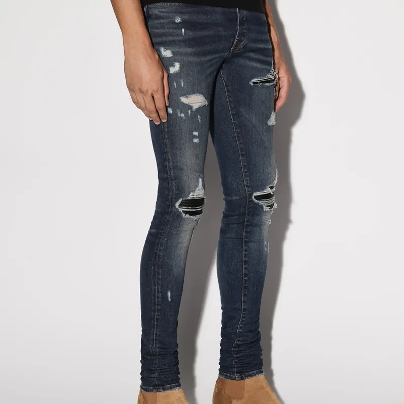 AMIRI Logo Distressed Skinny Jeans-3
