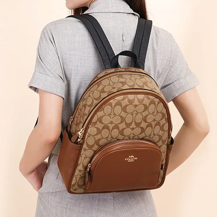 COACH Court Coated Canvas With Refined Pebbled Leather