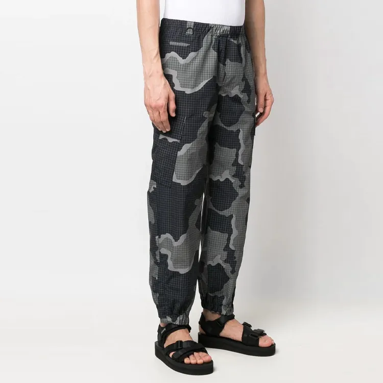 UNDERCOVER Camouflage print Jogger Pants-7