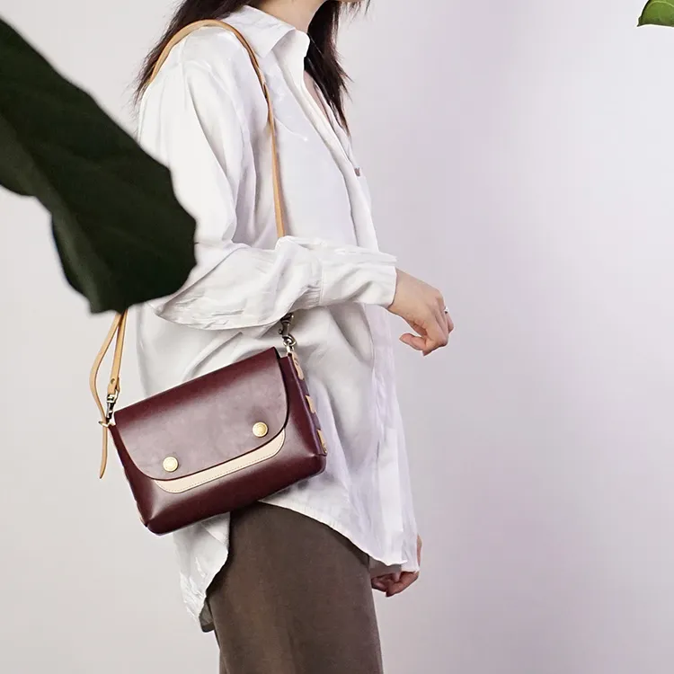 LINE ARTISANAL Crossbody Bags-13