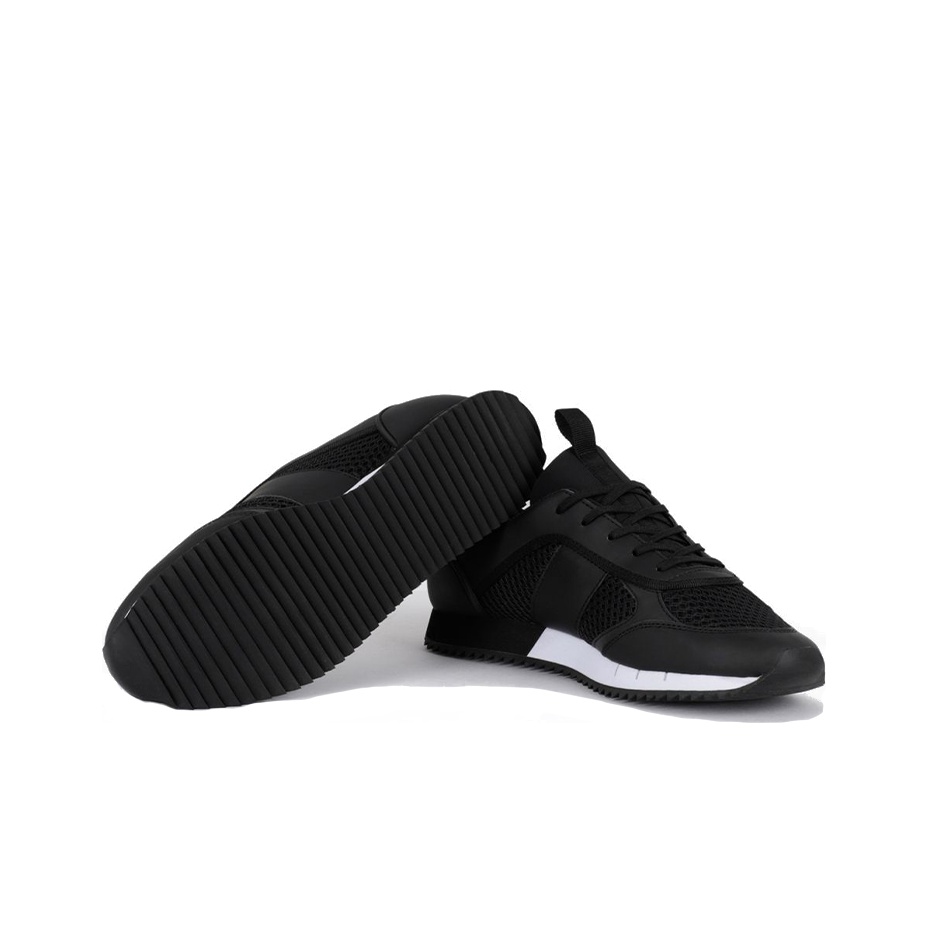 black trainers with white stripe