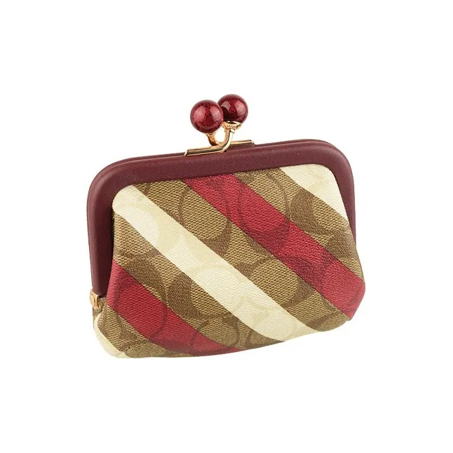 COACH Kisslock Clutches-1