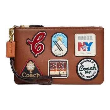 COACH Wristlet Clutches