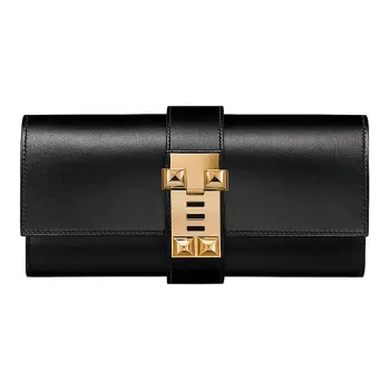 HERMES Medor Clutches