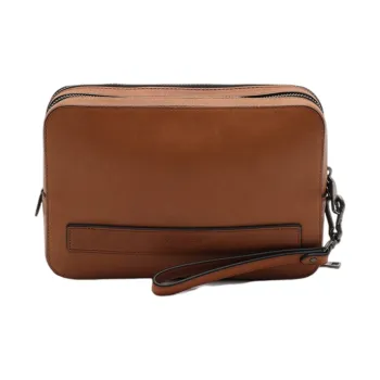 COACH Pouchette Clutches