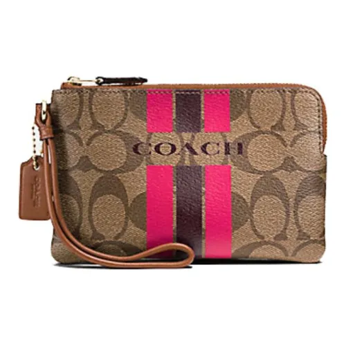 COACH Corner Zip Clutches