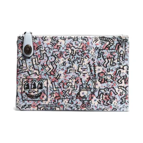 Keith Haring X COACH Turnlock Clutches