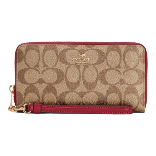 COACH Zip Around Clutches