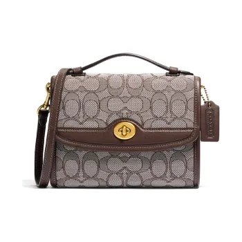 COACH Kip Handbags