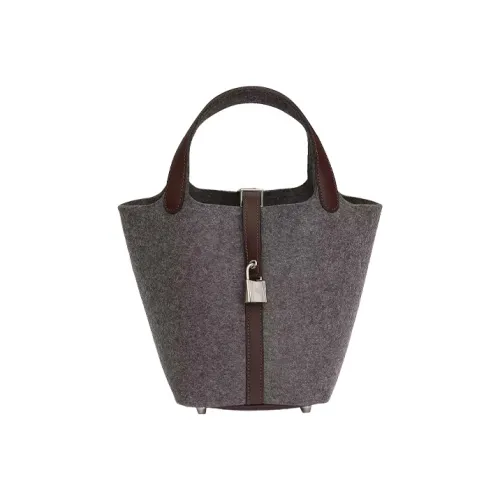 Bolso bandolera Hermes Jypsiere en cuero togo azul