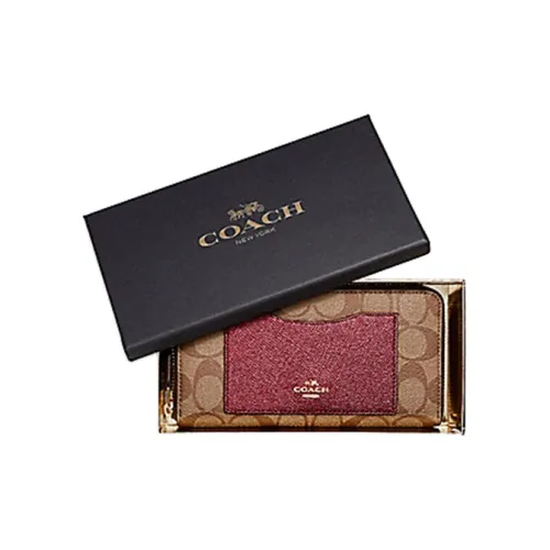 COACH Boxed Clutches