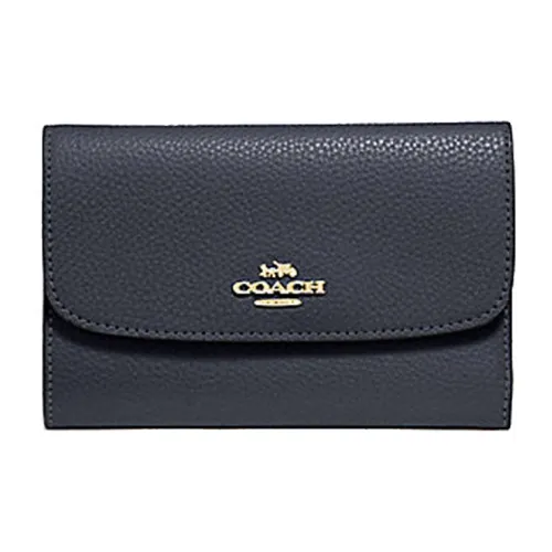 COACH Envelope Clutches