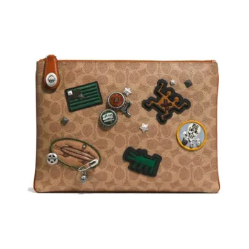 Keith Haring X COACH Turnlock Clutches