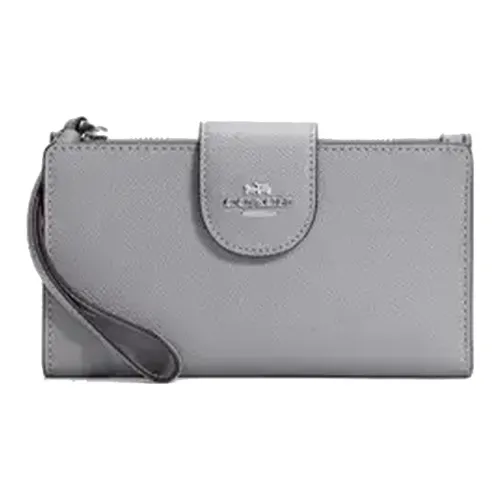 COACH Tech Wallet Clutches