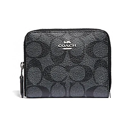 COACH Zip Around Clutches