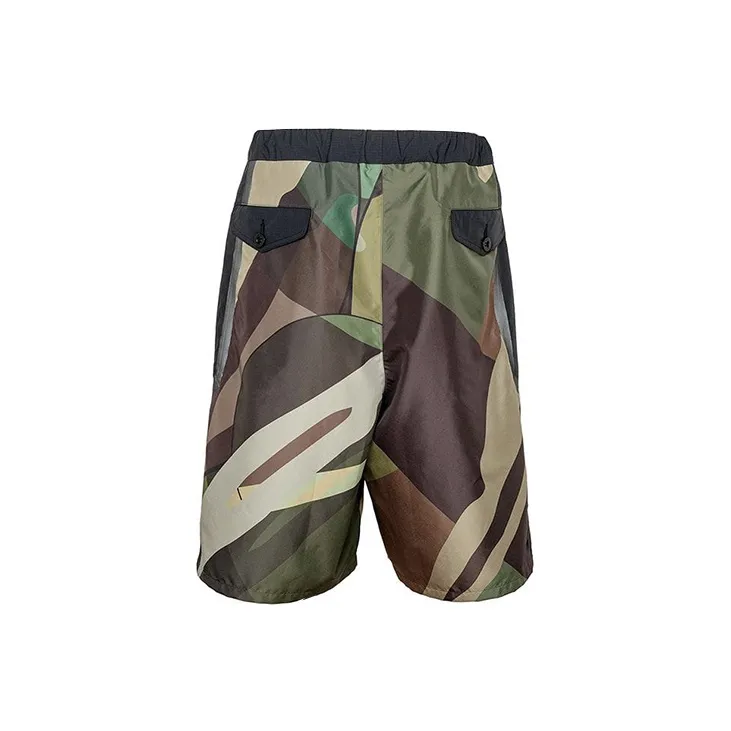 KAWS X Sacai Track Shorts-4