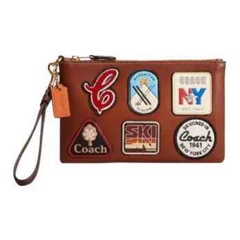 COACH Wristlet Clutches