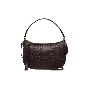 COACH Sutton Handbags