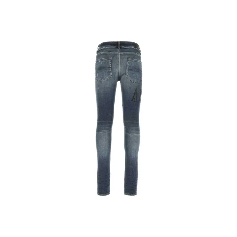 AMIRI Logo Patch Distressed Fitted Jeans-1