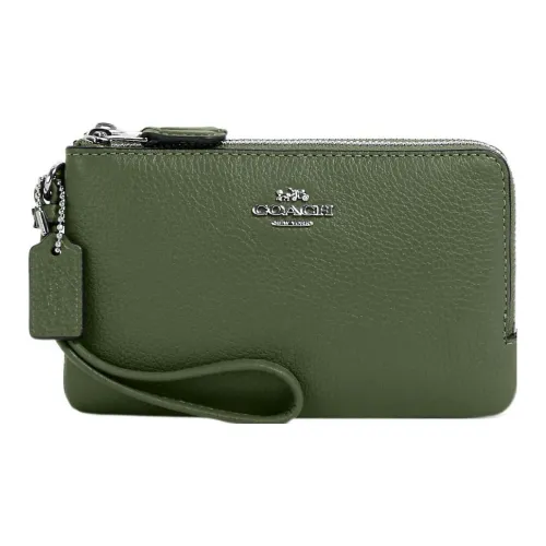 COACH Corner Zip Clutches