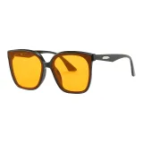 Black Frame with Orange Lens