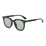 Black Frame with Green Lens