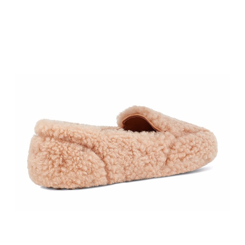 Peach fluffy confusingv uggs