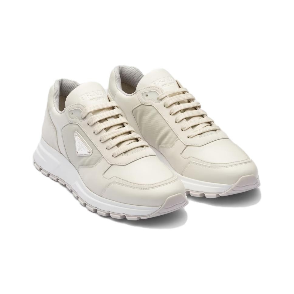 スニーカー PRADA 25SS Ivory Triangle Logo Sneakers 2EE369 3LQK F0304 Prada triangle-logo Padded Sneakers | White | FARFETCH