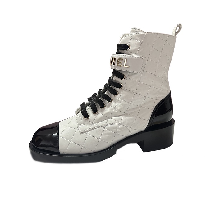 Black and white chanel boots online