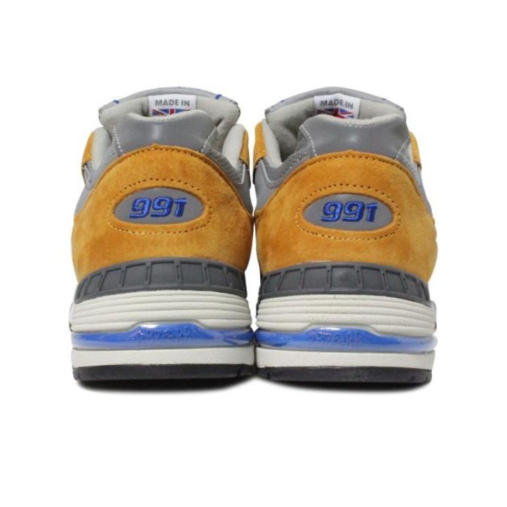 New balance 991 navy yellow best sale