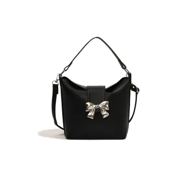 Meow in the grass Handbags