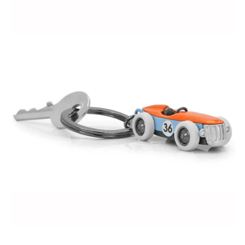 Meta[l]morphose BIG In Miniature Keychains Unisex-2