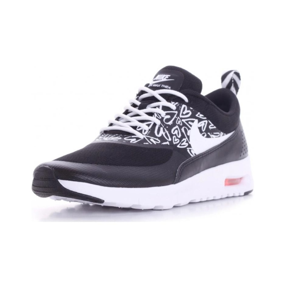 Nike thea print trainers hotsell