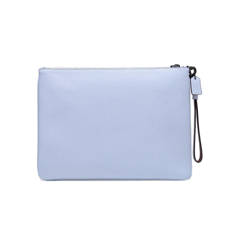 Keith Haring X COACH Turnlock Clutches-2