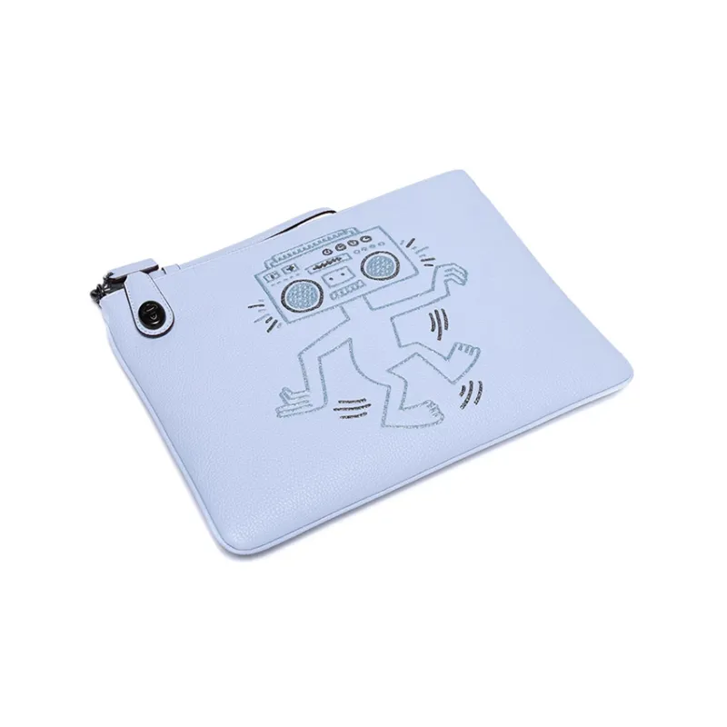 Keith Haring X COACH Turnlock Clutches-3